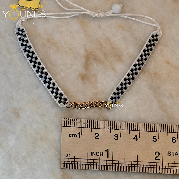 دستبند میوکی کارتیر طلا شطرنجی